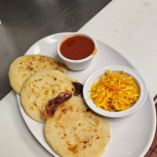 Pupusa Revuelta (Pork and Cheese)